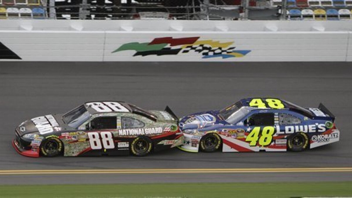 RacingPast's tweet photo. Jimmie Johnson helps push Dale Jr in the summer Daytona race. https://t.co/gbpXFuDis1