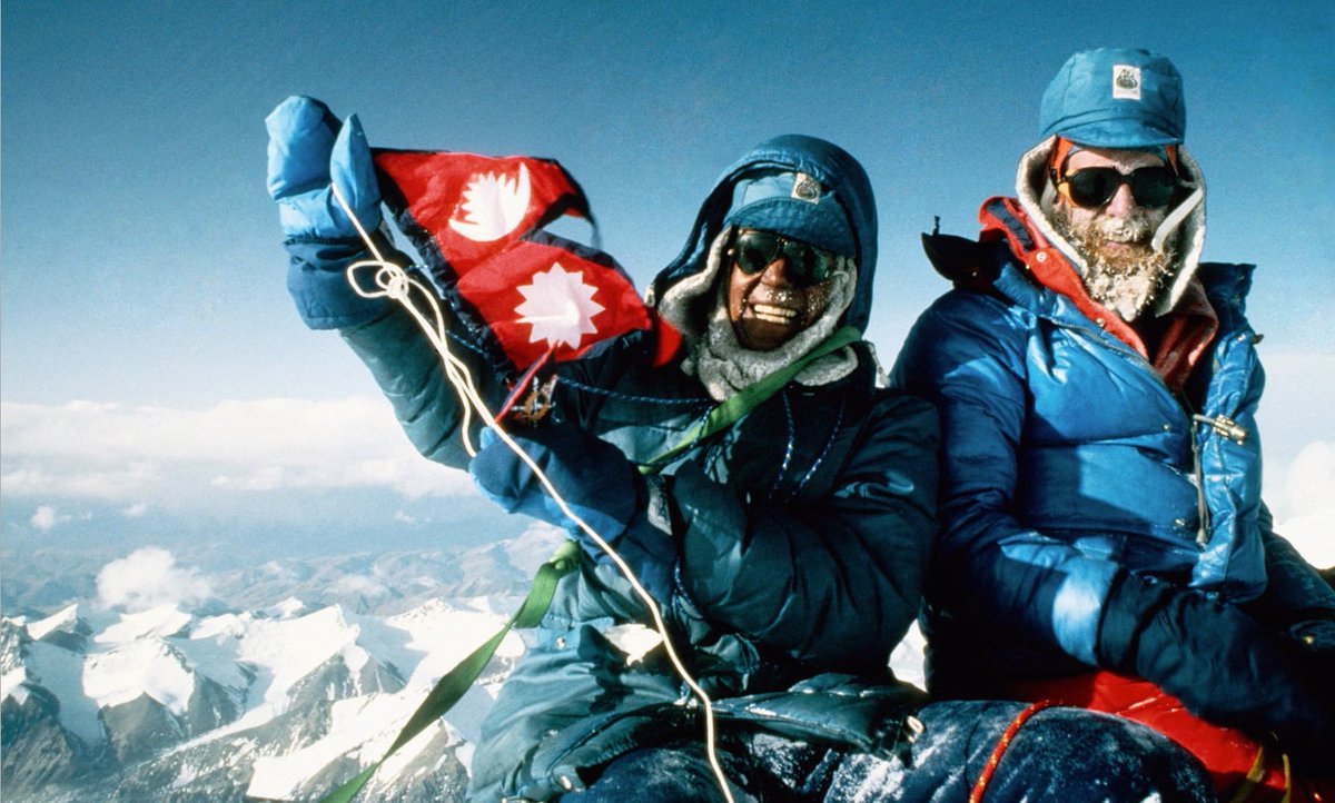 This is Ang Rita Sherpa and Peter Jamieson on the summit of Mt #Everest (8848.86 m) on May 7, 1983. This was Ang Rita's first of ten Everest Summits without supplementary Oxygen. Ang Rita died on Sept 21, 2020, aged 72. Photo Courtesy: Gerry Roach.