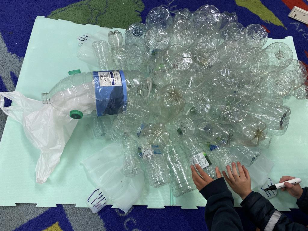 SrinandaGupta's tweet photo. Our last stage of the PYPx journey before the staging day … taking action by creating a plastic sculpture! #dwightschoollondon https://t.co/cY80KDC9F5