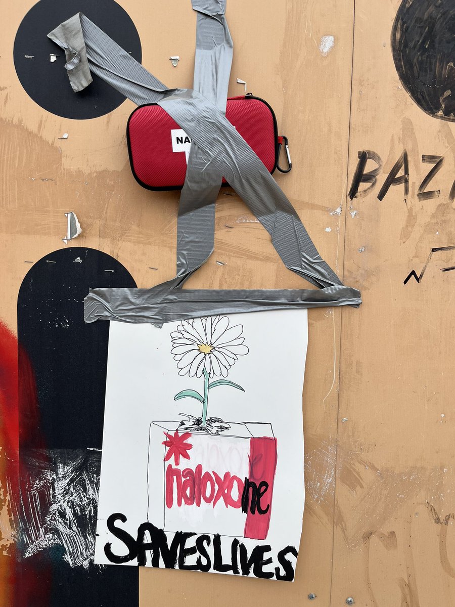 Taped to the corner of the construction boards around the Osborne Village Inn. Full kit inside. Awesome direct community work.