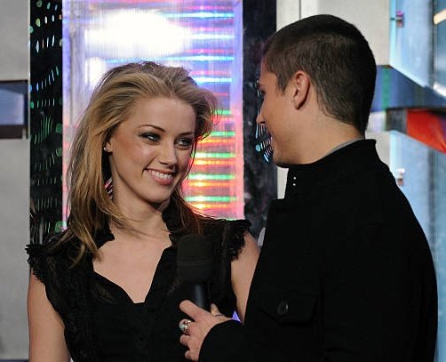MAKE-UP?So we talked about cosmetic surgery, eating disorders, accutane, even anxiety... but the most simplest answer: make-up. Here's Amber Heard form an appearance on TRL with Sean Farris back in 2008- & if it weren't lack of swelling, one might wonder. #DebunkingBruises