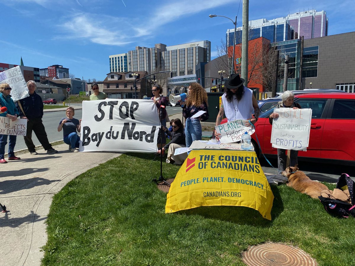 SJCNL709's tweet photo. Protestors rally in #YYT at #Equinor AGM demanding the corporation #StopBdN
Organizer @kdsocanth addresses the group. 
Protestors hold a banner than says Stop Bay Du Nord. Other participants hold signs that say Justice and Sustainability before profits, &amp; NL Rejects Bay Du Nord https://t.co/13d4HLIoiL