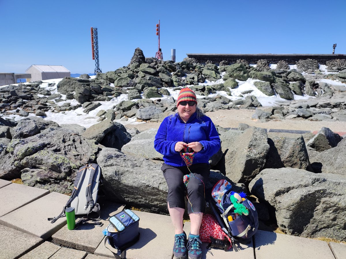 floodqueenGB's tweet photo. Bit of Al fresco knitting at the Summit of Mount Washington, New Hampshire. Bit windy so yarn held between the knees! #ExtremeKnitting ? (It another version of the hat on my head!) https://t.co/11S0YMx8If