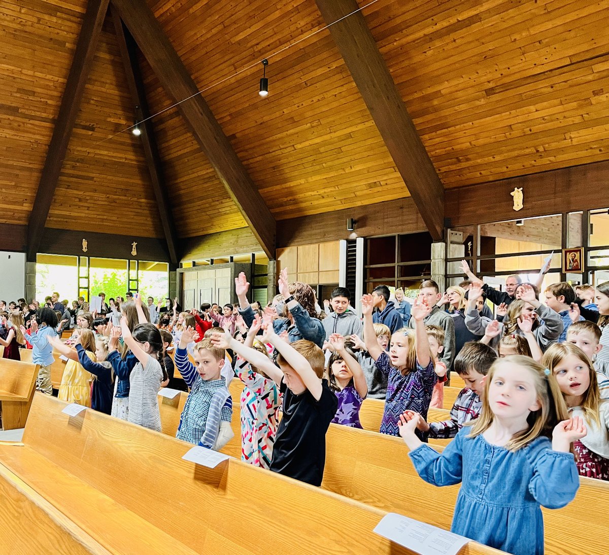 SaintPaul60's tweet photo. We are so excited to have the whole school back at Mass! Today was our first all-school in person Mass in over 2 years! Thank you to our Kindergarten class for hosting all of us. https://t.co/2xsY3fl5zu