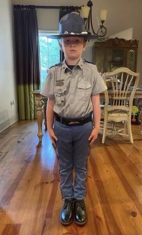 MSHwyPatrol's tweet photo. Trooper John Harris died on May 28, 2021, while conducting a traffic stop on Highway 16. Trooper Harris’ son Coop honored his father's memory on the last day of school by wearing a Highway Patrol uniform. Continue to lift this family in prayer as we enter National Police Week. https://t.co/SARQqCMncV