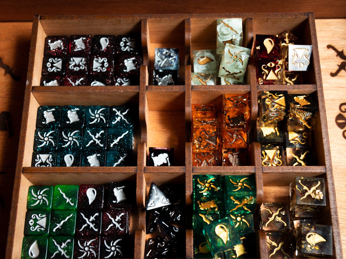 BAGamesCo's tweet photo. I am so frikkin' jealous right now! These 4 special pledges are being sent out this week. @DawnbreakerD did an amazing job on those dice!!! 🔥🔥

#boardgames #boardgame #Kickstarter https://t.co/9CglQfZ8ep