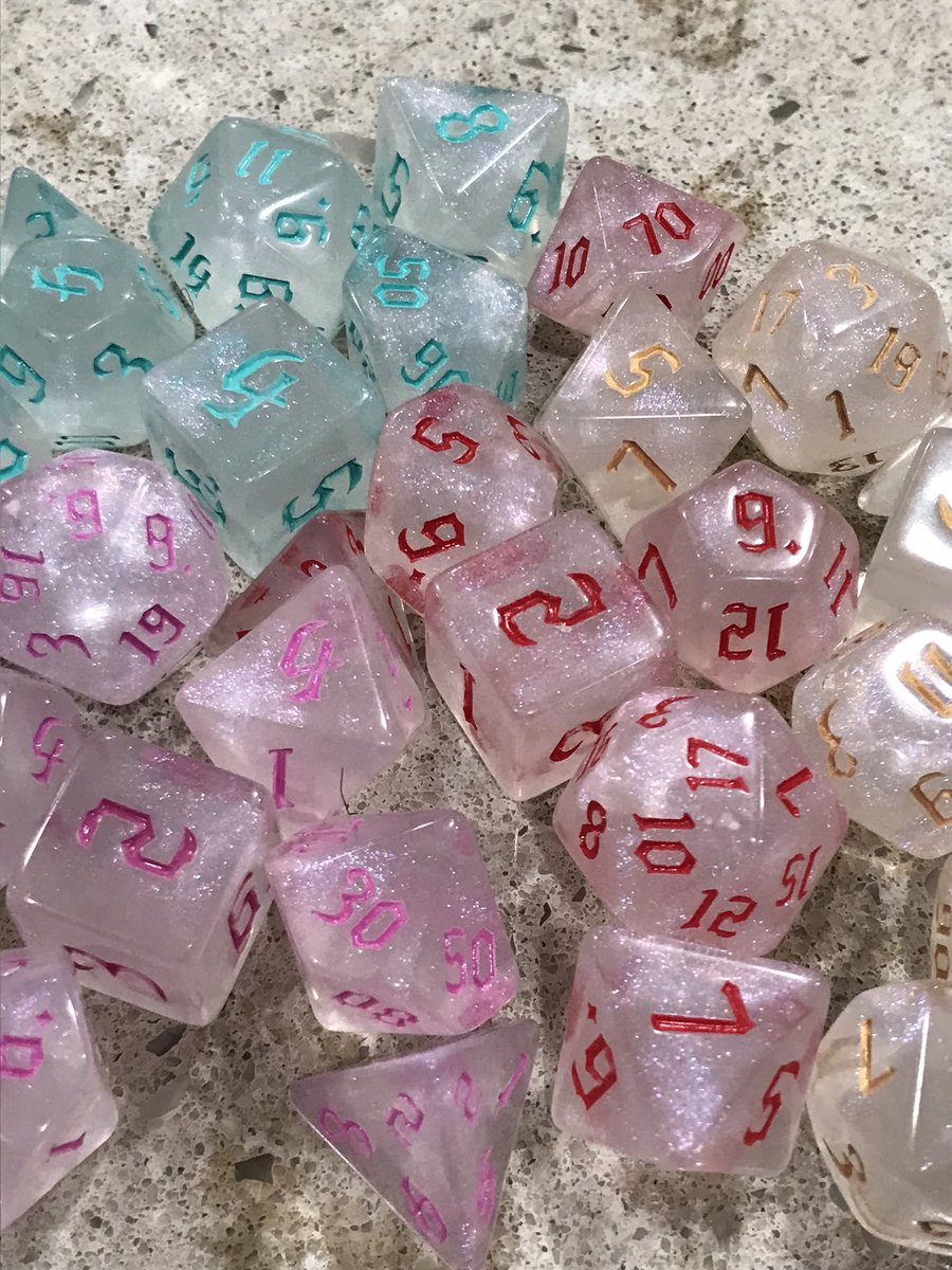 JDogTheJester's tweet photo. New dice from @TabletopLoot ! Really pretty this month. Love how sparkly the dice are and how vibrant the colors are. #LootTroupe is always worth it. https://t.co/Xyo752Fe3q