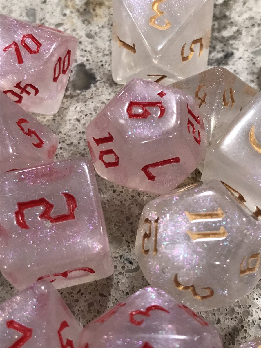 JDogTheJester's tweet photo. New dice from @TabletopLoot ! Really pretty this month. Love how sparkly the dice are and how vibrant the colors are. #LootTroupe is always worth it. https://t.co/Xyo752Fe3q