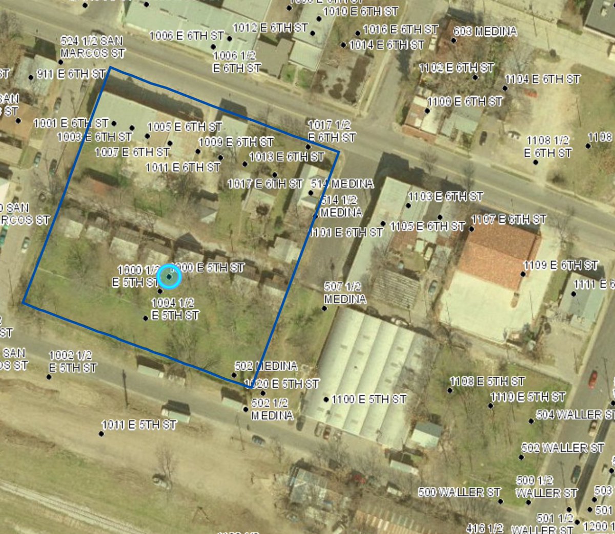 EastBelow's tweet photo. @atxtransitblog Helps that the Latino neighborhoods there were decimated by gentrification. The lot on the right had the 13 houses on it demolished in the early 2000s and the left side of the street is a railway siding. A lot easier to remake an area in your image when the residents are ignored. https://t.co/RcwY0vMPmj