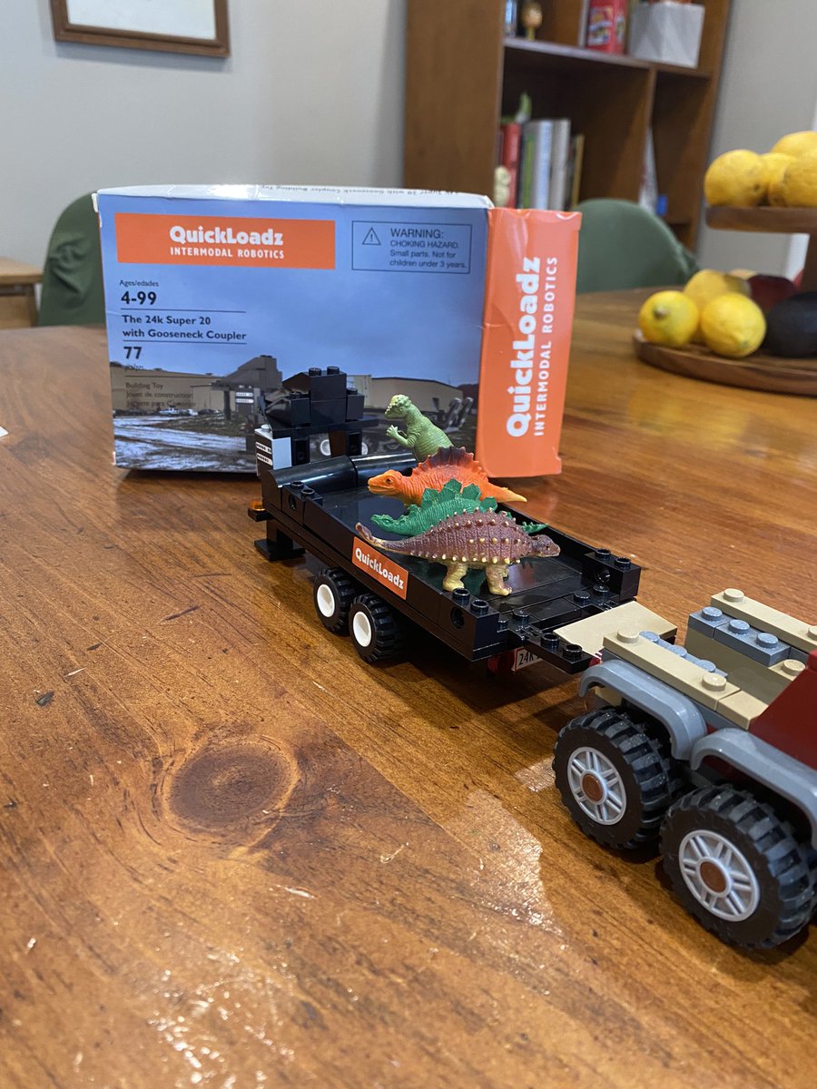LeBlancly's tweet photo. This @QuickLoadz building set from #FOSC22 may be hands down my favorite branded swag ever. (It was very quickly co-opted for the Jurassic World #supplychain) https://t.co/k2aIpyqZLJ