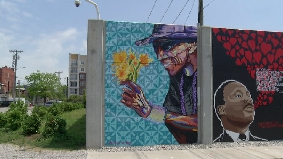 Local3News's tweet photo. REMEMBERING SANDY BELL: A Chattanooga icon is now being recognized in our city. A vibrant mural of Sandy Bell, aka The Flower Man, is displayed on 10th Street. https://t.co/49nYQ4Z1fO https://t.co/gqkHvsx2Bs