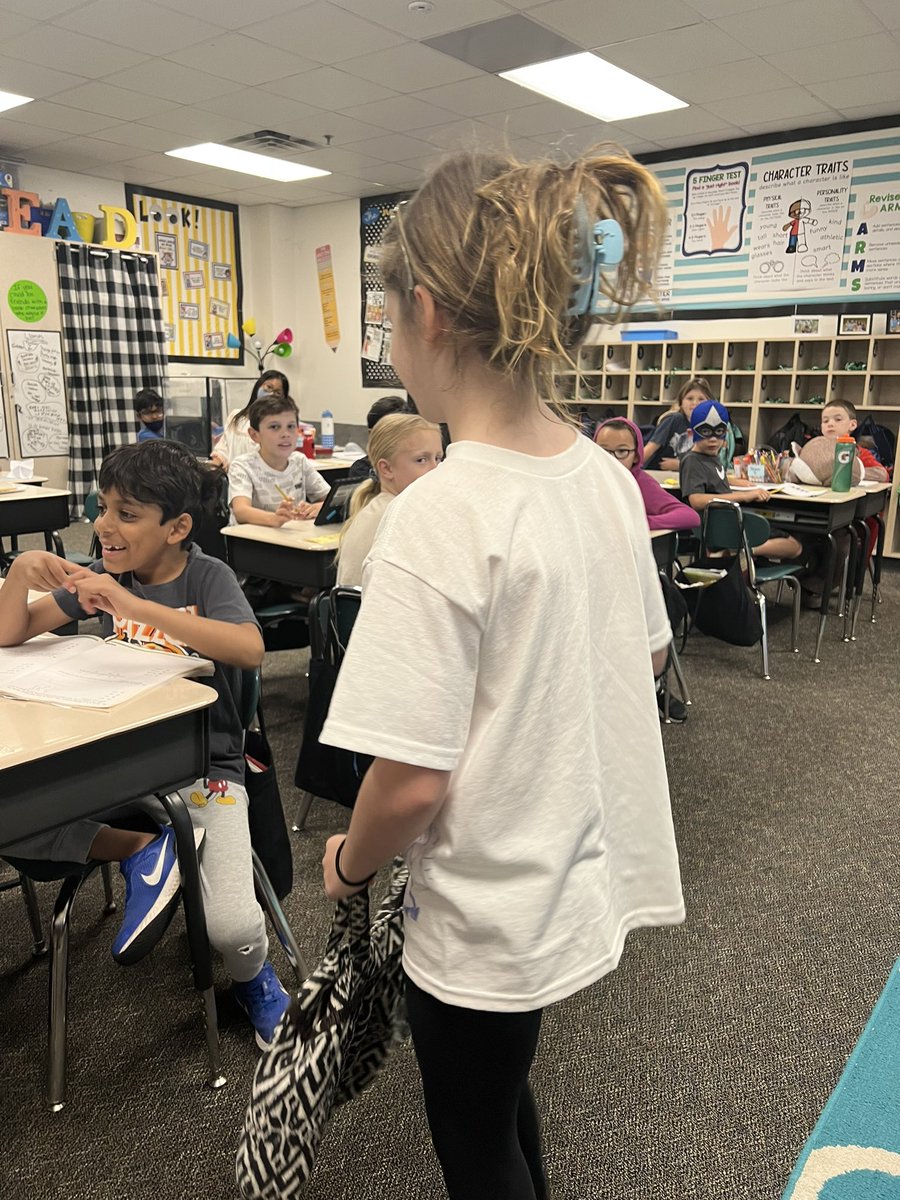 It was superhero dress-up day in 2nd grade, and this cutie dressed up as a mom. 🥰 I laughed extra hard when I realized I was thisclose to wearing my hair like this today, too…except unironically. 😆