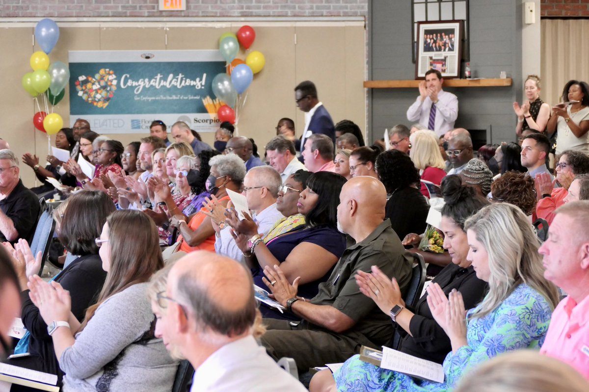 A full crowd clapping