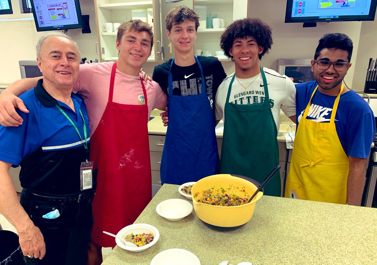 GWBusFACS's tweet photo. Culinary 1 had a special guest today! Chris the security guard shared some of his culinary memories as these boys shared their Southwest Quinoa with him!  Go West! @GWHilltoppers https://t.co/zzYkTuR7RT