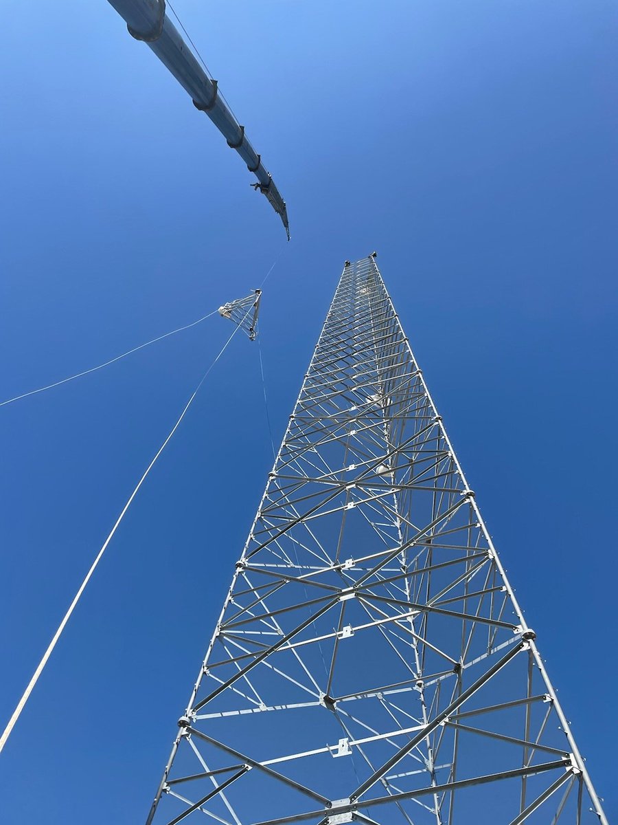 tower_hayden's tweet photo. Joel and crew getting it done topping out this self-supporting tower.  The work they are doing improves the safety and reliability of the electric grid. https://t.co/Wp4Jf1QIkO