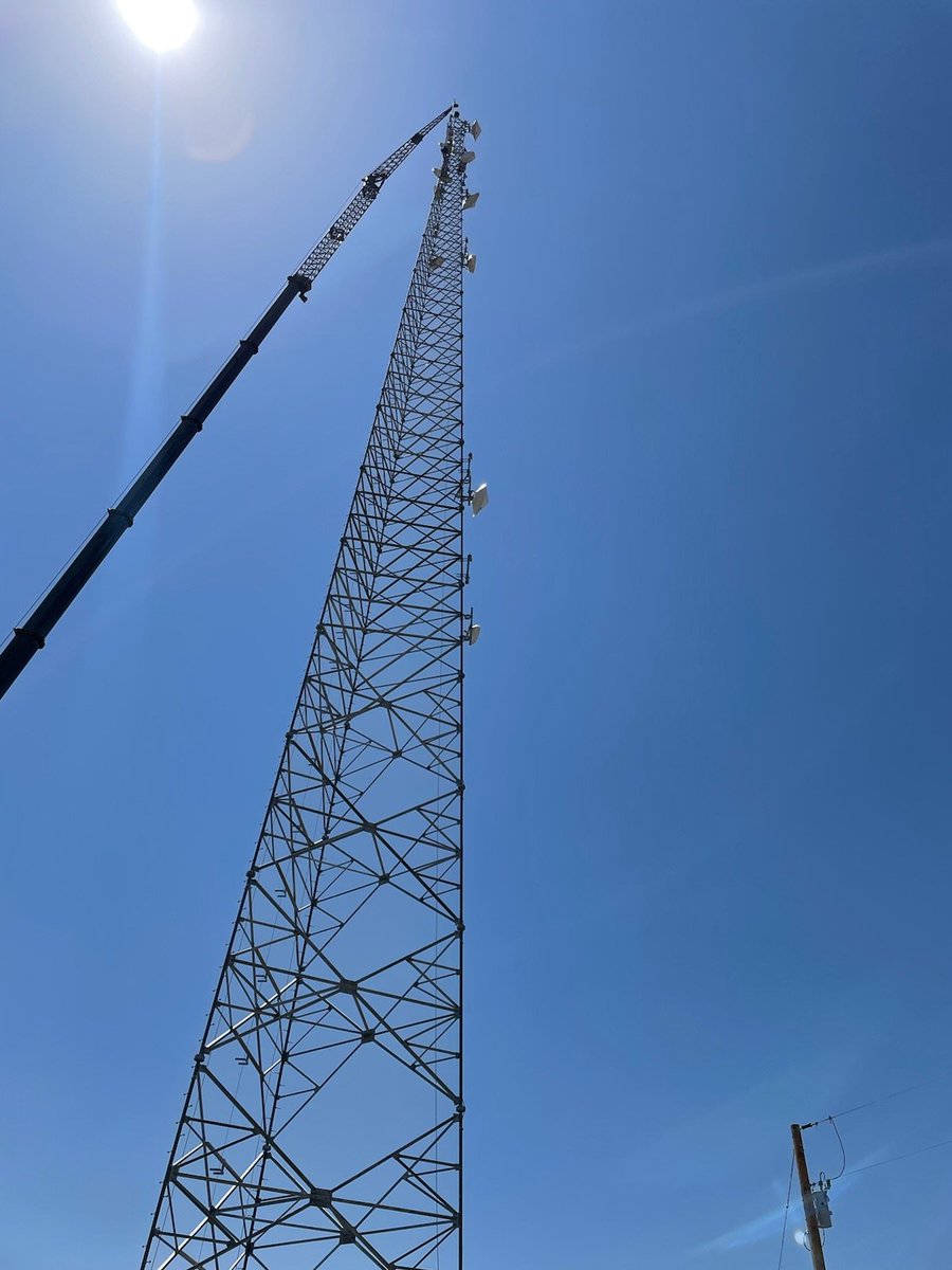 tower_hayden's tweet photo. Joel and crew getting it done topping out this self-supporting tower.  The work they are doing improves the safety and reliability of the electric grid. https://t.co/Wp4Jf1QIkO