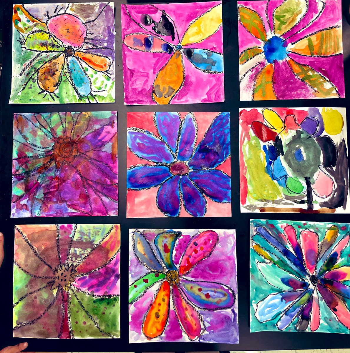 These paintings are sure to brighten your day! Kindergarten artists are working to blend colors to create colorful flowers! 🌸 #avonworthartists @DrMillerASD