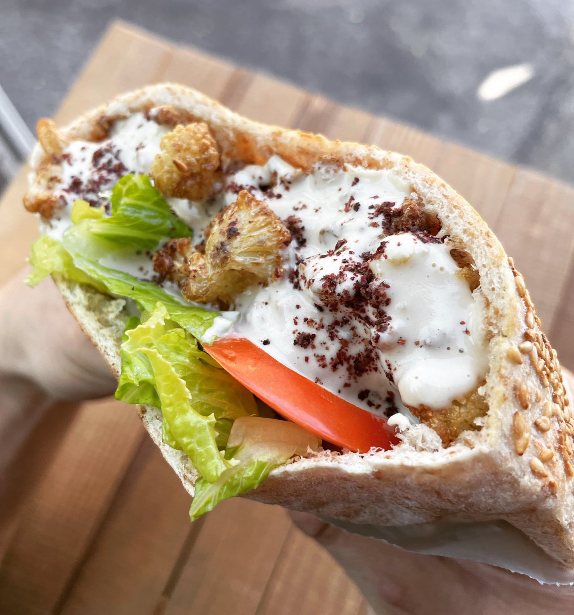 Falafelonwheel's tweet photo. Now available!!!! 
Fried cauliflower Sesame Pita Pocket Sandwich 
Ingredients: Toasted pita, Cauliflower, Romaine Lettuce and Tomato dressed with Tahini sauce and Sumac 
You can call it as well the bomb sandwich 😍

#bestfalafelintown #vegan  #ottawafoodtruck #foodporn https://t.co/SEfxueAFd1