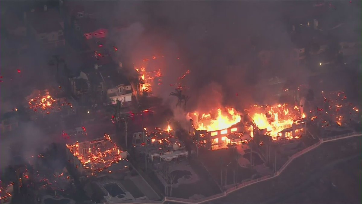 KTLA's tweet image. Orange County fire officials say the #CoastalFire has burned more than 200 acres and destroyed more than a dozen homes ktla.com/news/local-new…