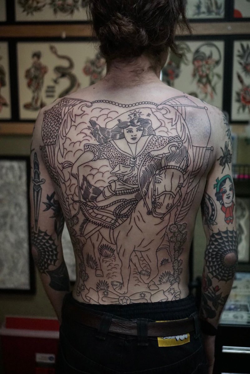 getting your lower back tattooed feels like straight hell. thanks to my guy ross henry