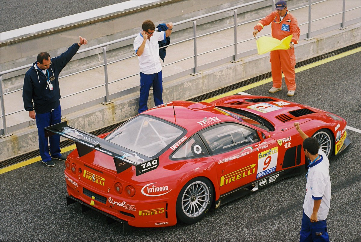 EstorilRP's tweet photo. The 1st victory of the Ferrari 575 Maranello GTC happened on its 1st race.
It was at Estoril, the 9th round of the 2003 FIA GT Championship.
The JMB Racing car was driven to the top spot of the podium by Fabio Babini and @phpeter69.

#20YearsOfEstorilRacePhotos
#TBThursday https://t.co/9FStgnLse1