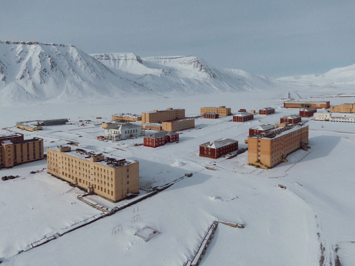 expedition_nft's tweet photo. Here's a digital aerial shot of #Pyramiden by #JordanRosen. We can’t wait to share the film with token holders both the physical copies and digital #NFTArtwork 🧭🎞️ #IRLUtility #NFT #NFTCommunity #ExpeditionToken https://t.co/W3UcpCxNZr