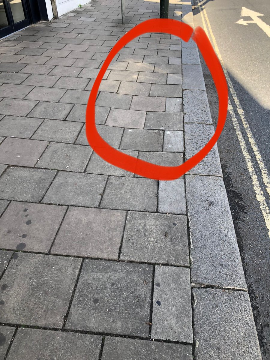 RichardHairUK's tweet photo. @LBRuT_Help this happened outside @RichardHairUK today. 3rd incident in 5 months. Could have been far worse if  this poor lady fell into the road with oncoming traffic. Lucky my team were there to help. This pavement needs fixing asap. https://t.co/bs2Drf6Jef