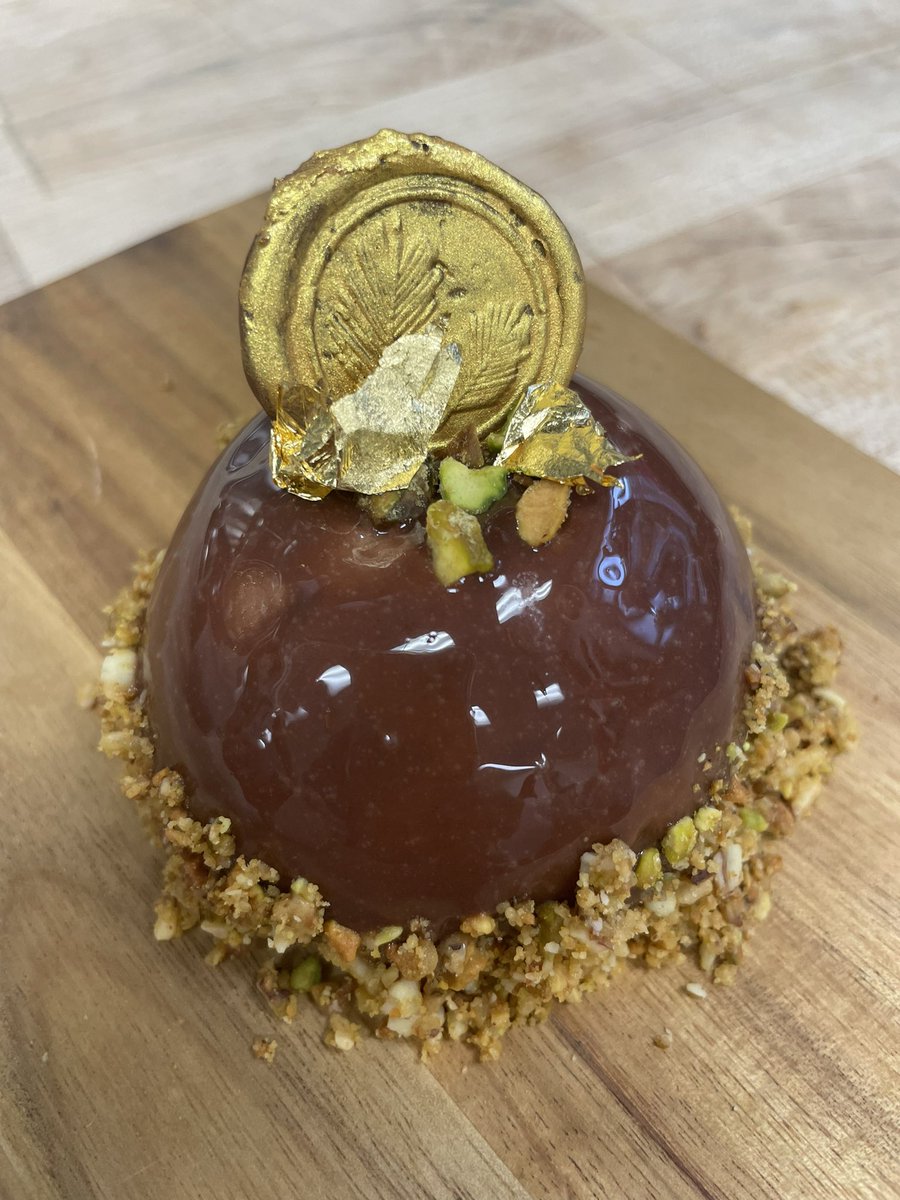 apexculinary's tweet photo. Chocolate Pistachio Dome: Pistachio Crème Mousseline - Vanilla Sable - Almond Pistachio Nougatine - Chocolate Mousse - Mirror Glaze - Gold Chocolate - Gold Leaf #culinary3 #pastryarts https://t.co/WcUFOMEiod