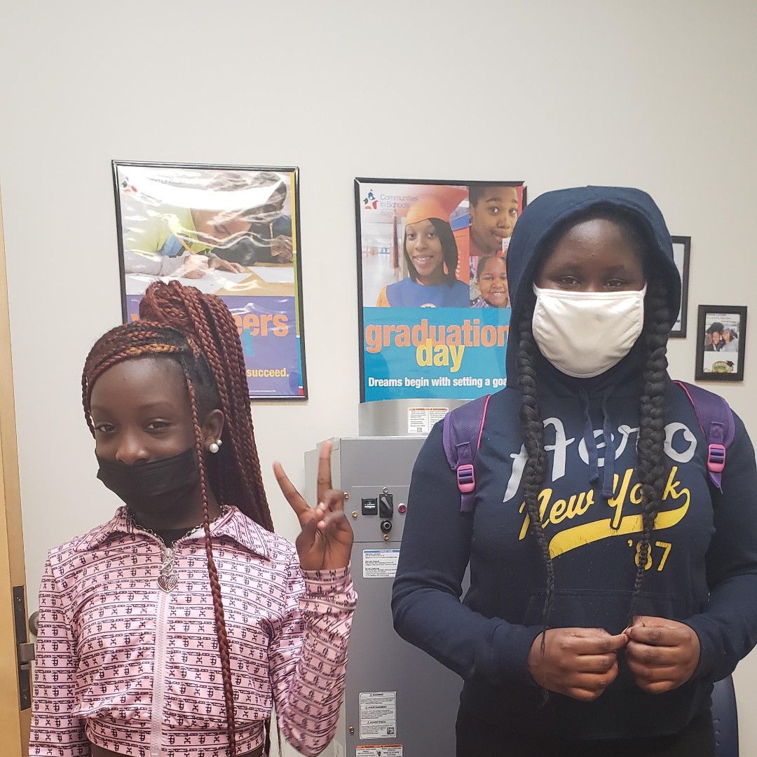 CISofRVA's tweet photo. La'Mya and Ny'Lasia showed up ready for their small girls group yesterday with Ms. DePriest (CIS Site Coordinator at MLK, Jr. Middle School). #allinforkids #cisofrva #smallgroupwork https://t.co/BON2b52D8d