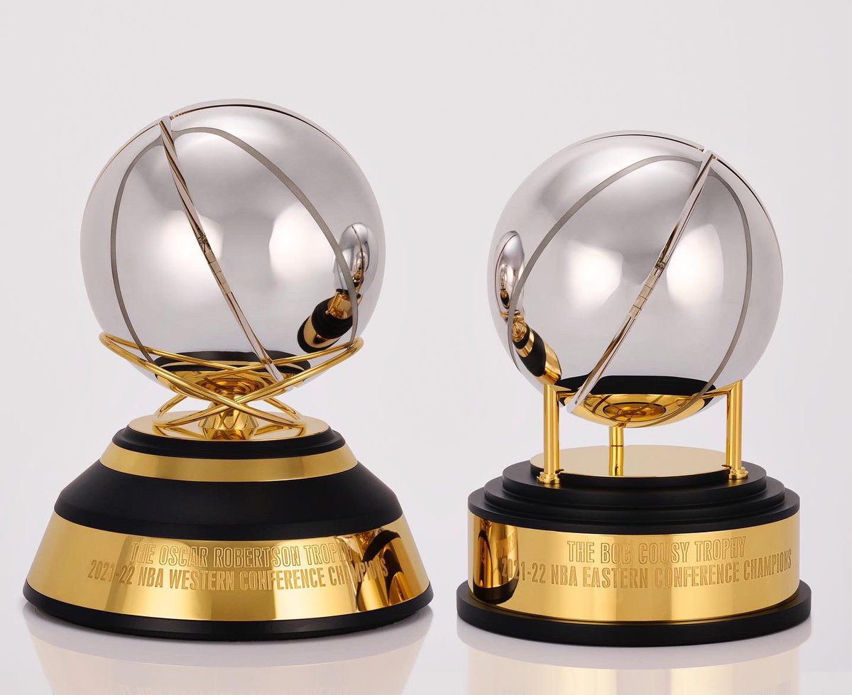 NBA's tweet photo. The conference champion trophies are named after two NBA legends, Bob Cousy and Oscar Robertson, for their outstanding contributions on the court and the impact they made as early presidents of the National Basketball Players Association. https://t.co/VH52ZOhKD2