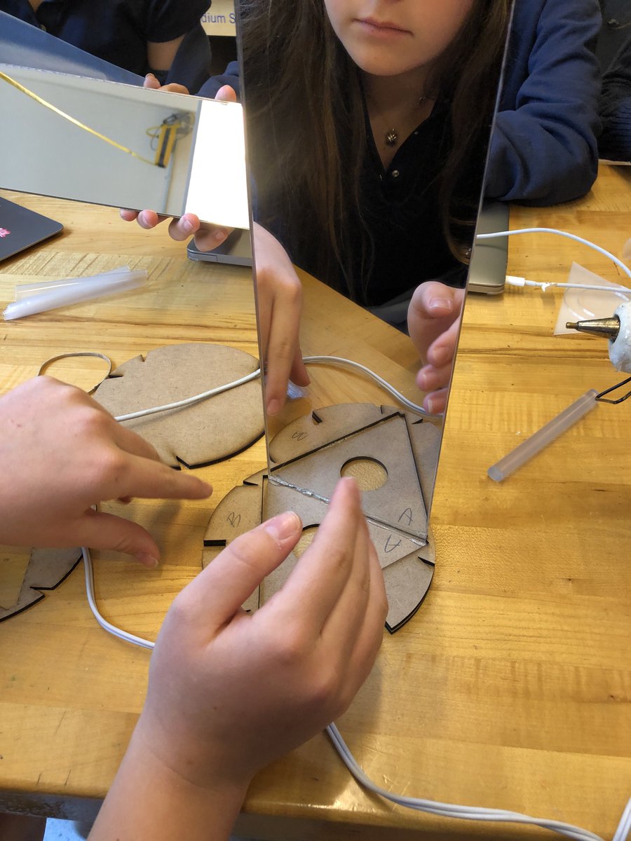 joshburker's tweet photo. Class VIII @MarymountNY are building #LightLogo kaleidoscopes from @openblackboard design. @EpilogLaser cut MDF and mirrored acrylic, #3DPrinted diffuser and neopixel ring holder. They will program designs that are reflected within. #art #math #programming #fabrication https://t.co/nxkuRvKiUL