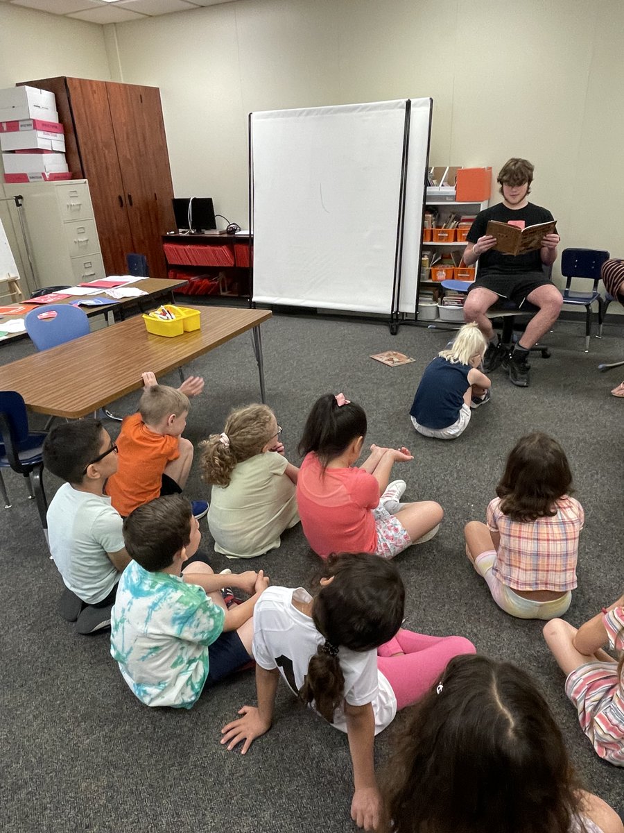 TheBridgeDCS's tweet photo. @TheBridgeDCS students delivered the Little Free Library they built to @DWEdublin and read to the elementary students today!  @DCSEmerald https://t.co/brOxNL5y8B