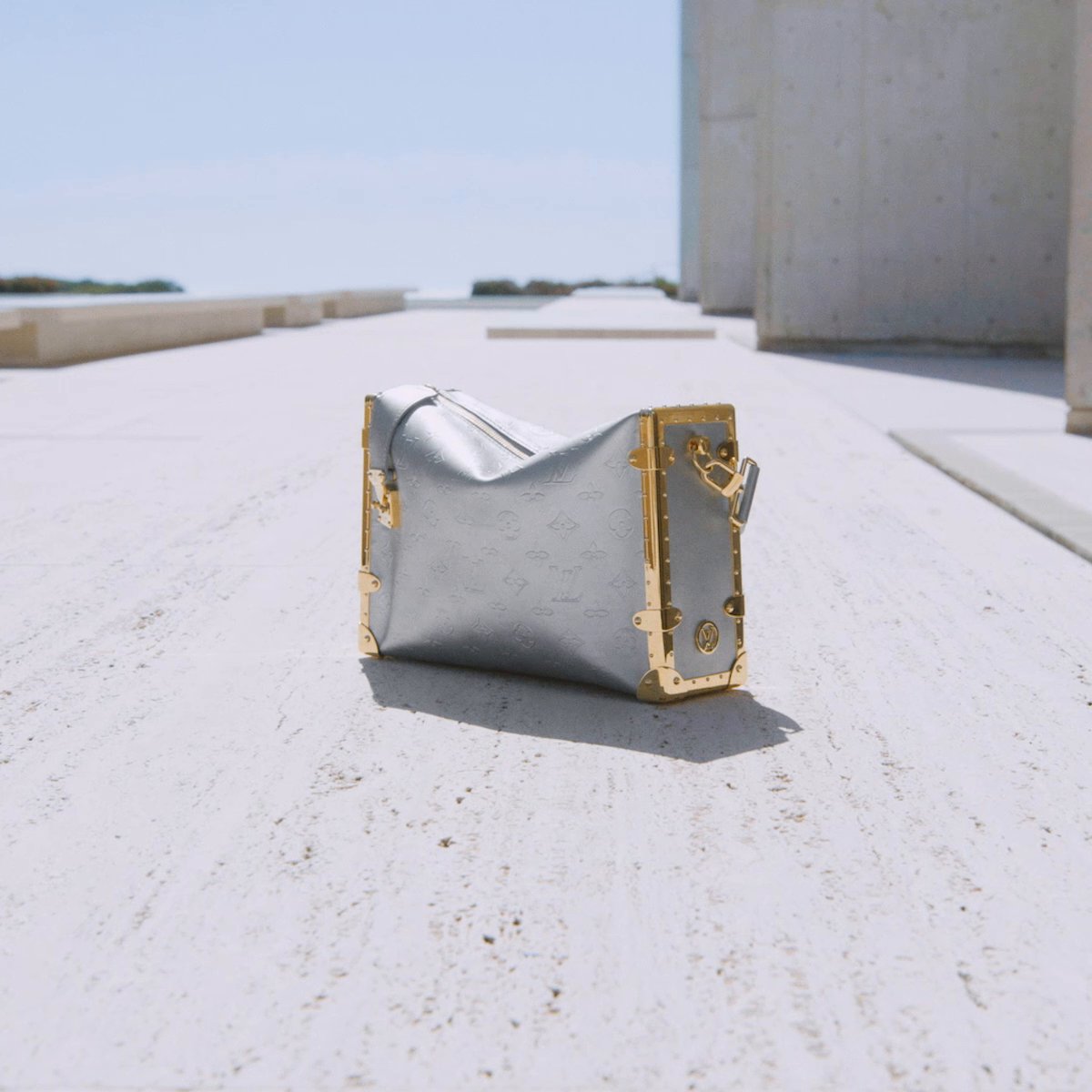 Louis Vuitton on X: #LVCruise Strong angles. A new bag from  @TWNGhesquiere's upcoming #LouisVuitton collection incorporates  motorsport-inspired padding in a range of metallic hues. Watch the fashion  show live on May 12th
