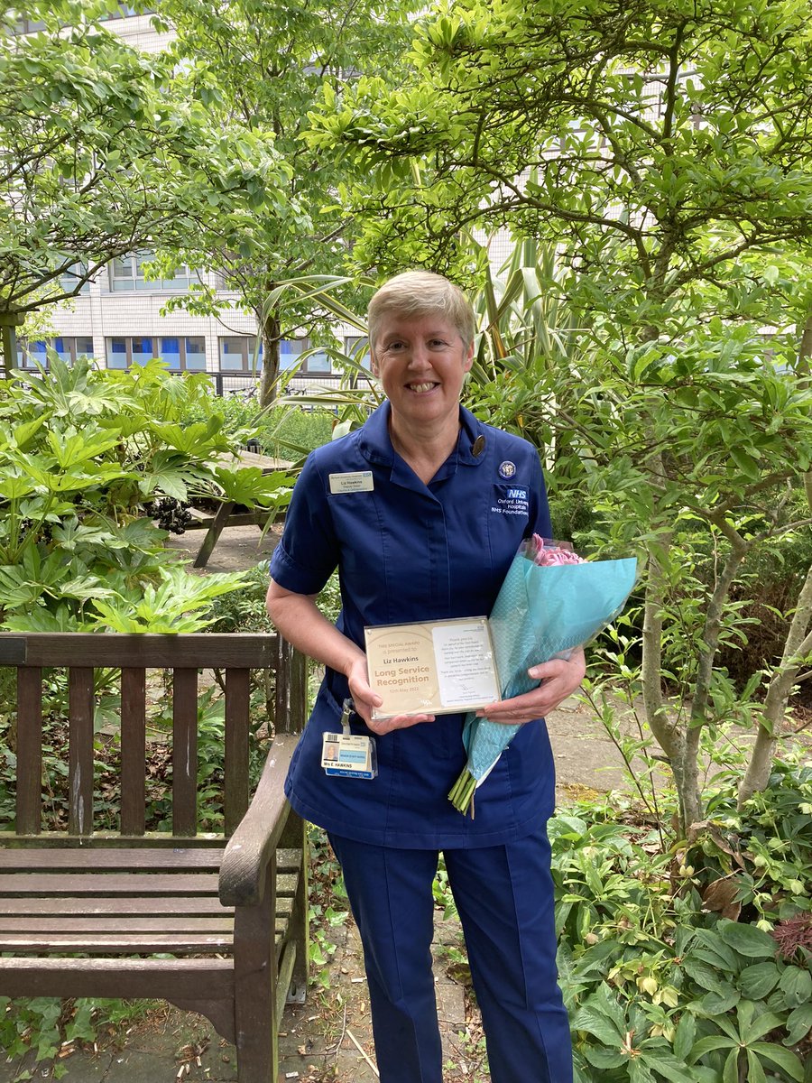leazy's tweet photo. Liz celebrating her long service award. https://t.co/DRaGxCYXWy