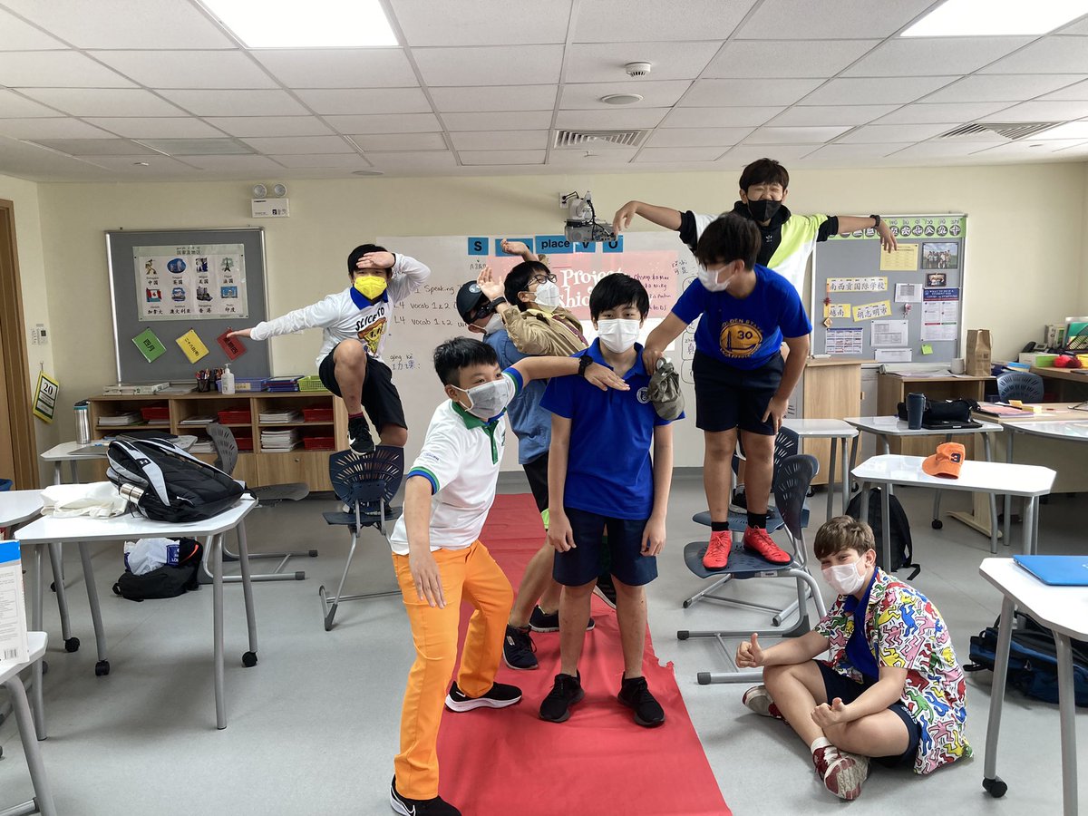 daisyteyalo's tweet photo. So happy to see that our middle schoolers were able to present freely on campus together. Their smiles (under the masks) and giggling are priceless. @ssischool #ssisworldlanguages https://t.co/cEXRbYw6bJ