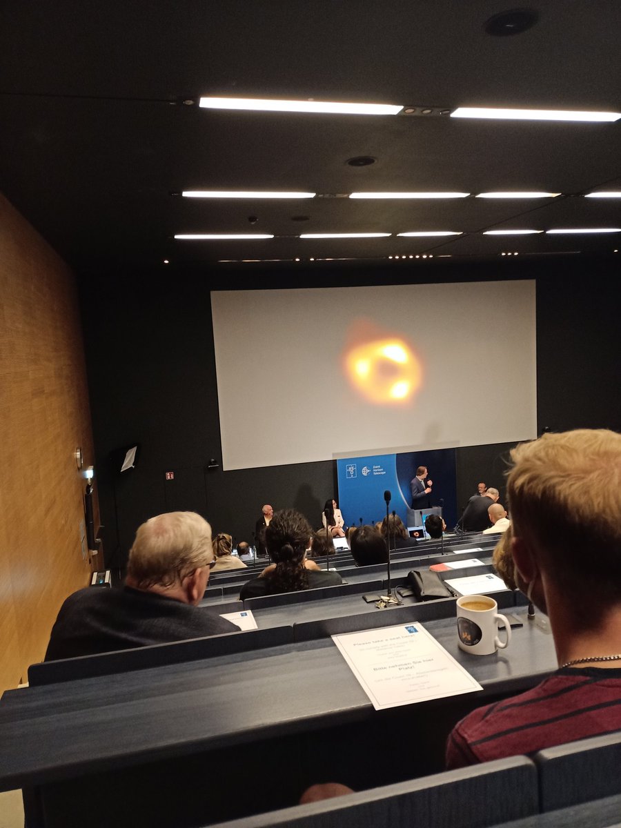 akosmic1's tweet photo. Nice to attend (in person^^) the press release of first image of MW Black Hole Sgr*A at @ESO HQ, Garching.
PS: Prof. Reinhard Genzel is sitting right ahead of me ;) https://t.co/4lSY8EiSPR