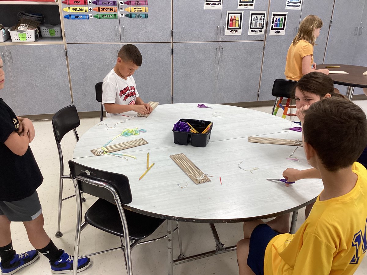 MrsKrinn's tweet photo. Third graders were very involved in learning to wrap a loom and weave. #BHESart https://t.co/GbJkNx1foz