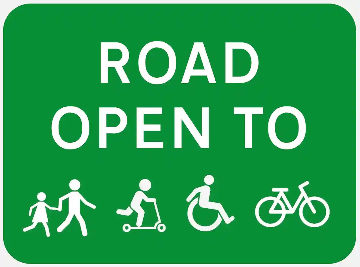 SligoCycling's tweet photo. Ah @sligococo you missed a trick to accompany your very positive action in opening O'Connell St for the #bikeweek22 Family Fun Day on Sunday! Sign on the barrier says 'Road Closed '.Why not print and add this one? @bob_coggins @conneally @UnaLEstrange @lucy_c_hayes @Gemma_Woods_ https://t.co/bcdqofherM