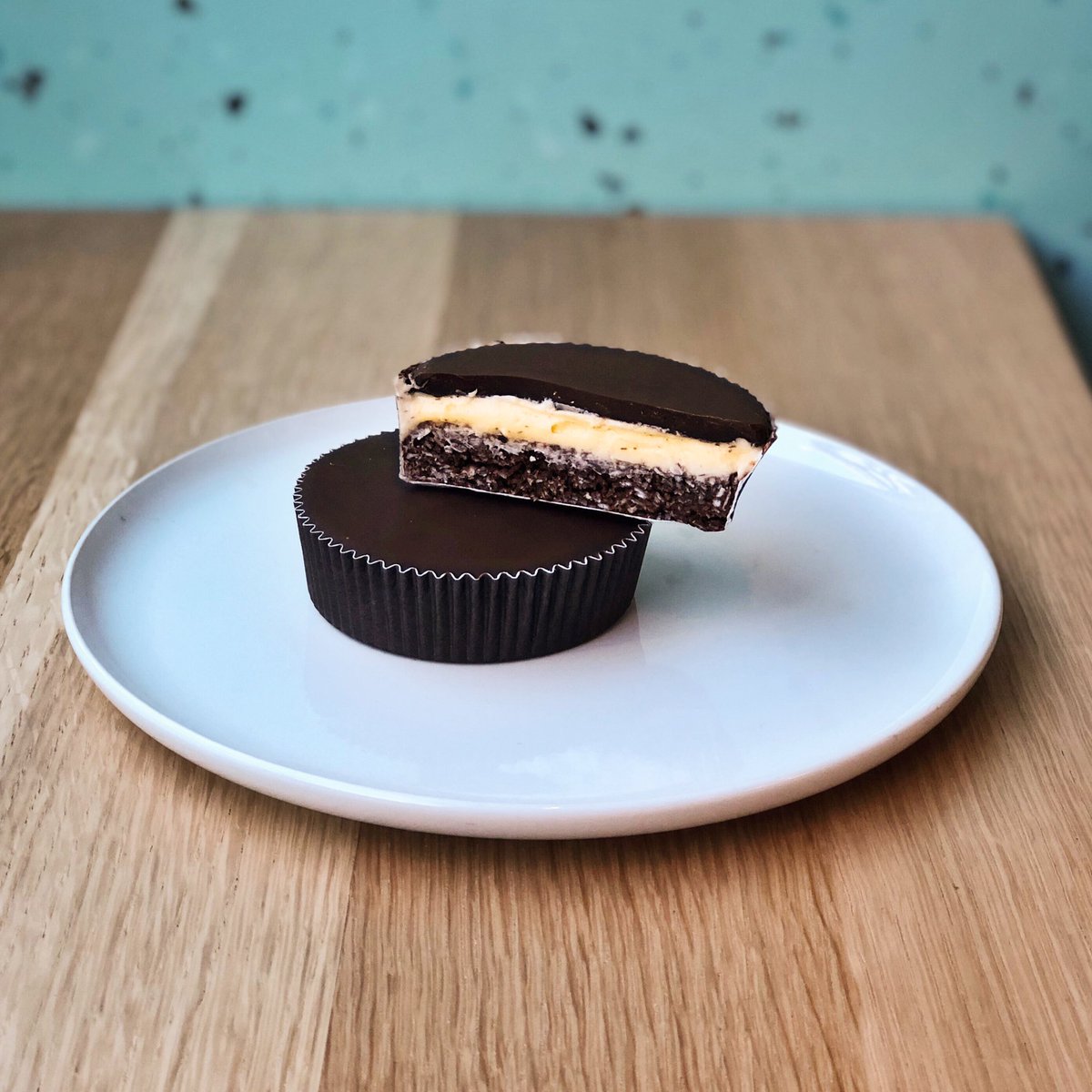 Nanaimo cups! Our take on a Canadian classic, featuring a coconut, cocoa and graham base (nut-free), vegan custard icing and a rich, dark chocolate topping! Available in the shop this weekend or in Fridays delivery box. Head to our site to order your box: bloomcookieco.ca/apps/builder?b…