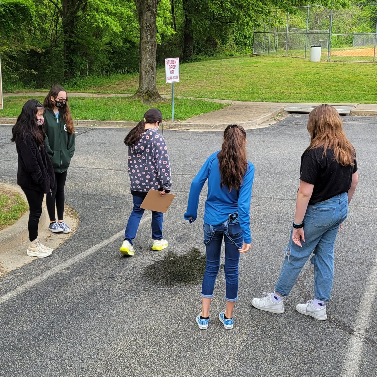alancook81's tweet photo. Eighth graders conducted a pollution survey and tested predictions on how rainwater travels in our school parking lot. It was a gloomy but productive day! #WaveofPlastic @UMCES @PlumPointMSCCPS @NatGeoEducation https://t.co/5imwmQcYwf