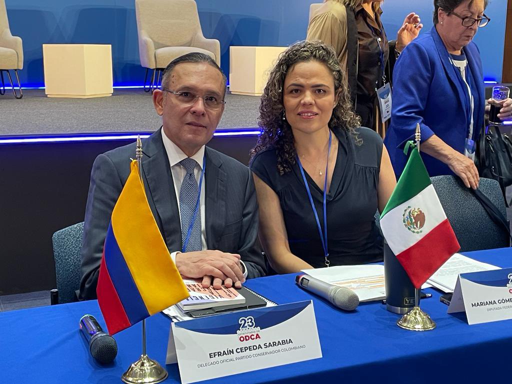 EfrainCepeda's tweet photo. Felicito especialmente a @marianagc por su elección como Presidente de la @ODCA. El liderazgo de las mujeres es garantía de desarrollo equitativo en nuestros países. Sabemos que seguiremos avanzando con un trabajo conjunto en favor de la democracia. #CongresoODCAMx #SomosODCA https://t.co/B2ucK7AA7u