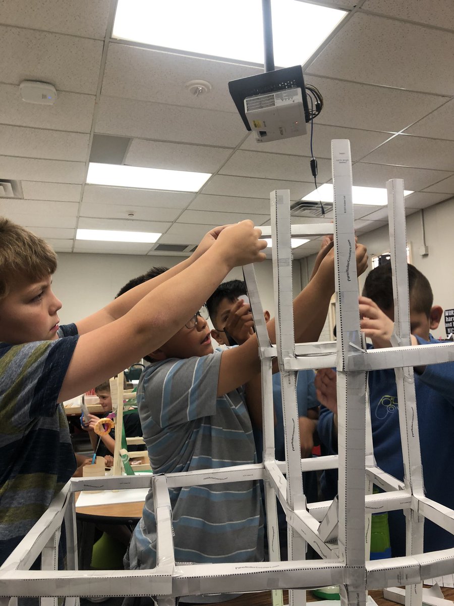 JagThinkerspace's tweet photo. Ask these 3rd graders about kinetic/potential energy, inertia, momentum, balance, stability, velocity, and centripetal force. These were the conversations these engineering teams were having as they constructed roller coasters with at least 8 turns, 1 funnel, and 1 loop. https://t.co/E55F9axtkw