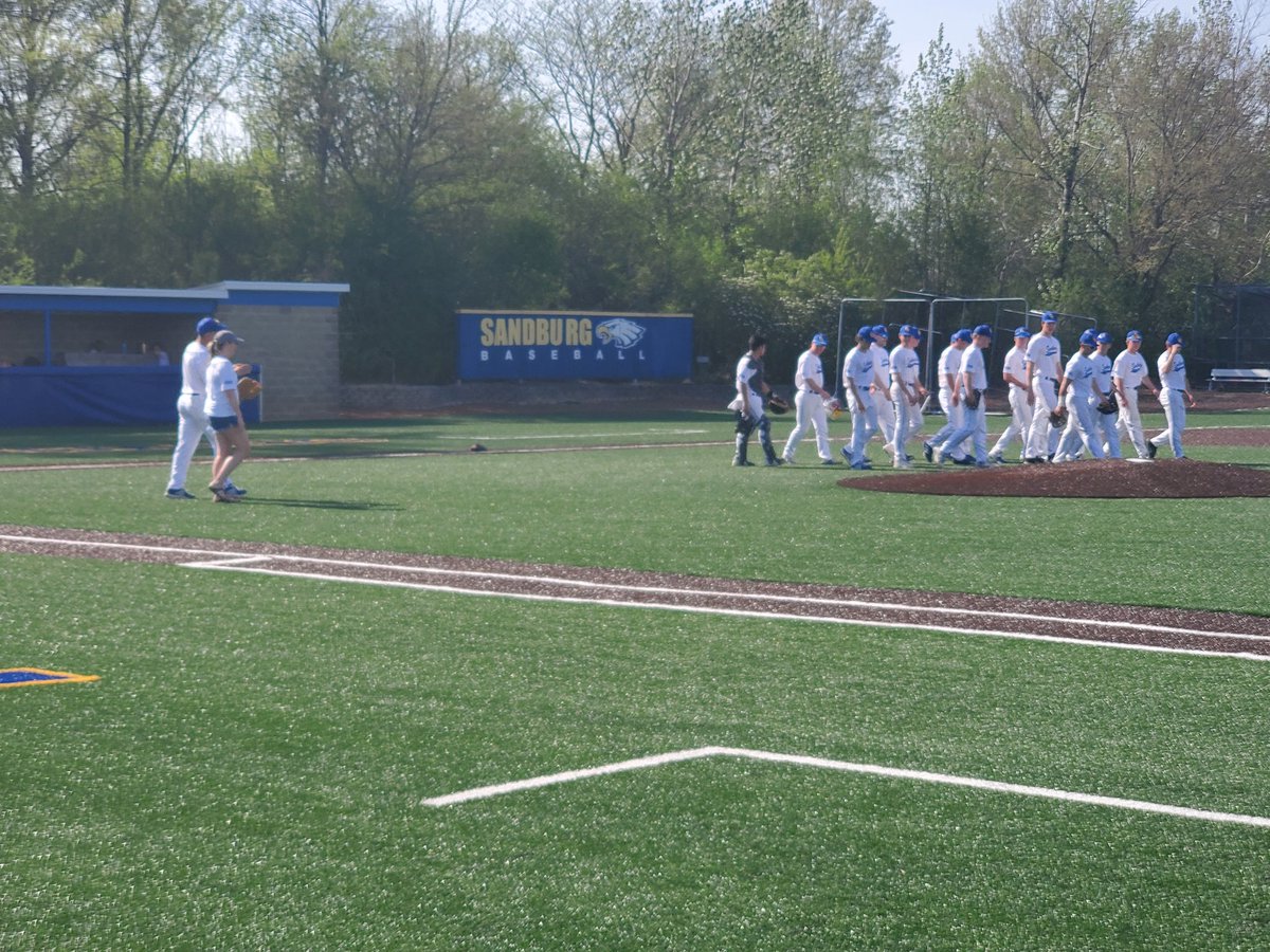 SandburgHS's tweet photo. Special moment for @csbaseball1 and Susie Kreis. @CoachKreis was a special individual and friend to our students,  staff,  and community.  He will be missed forever.  Thank you for everything! @CHSD230 @Rnolting21 @DSmithCSHS https://t.co/6dmLGWWfBd