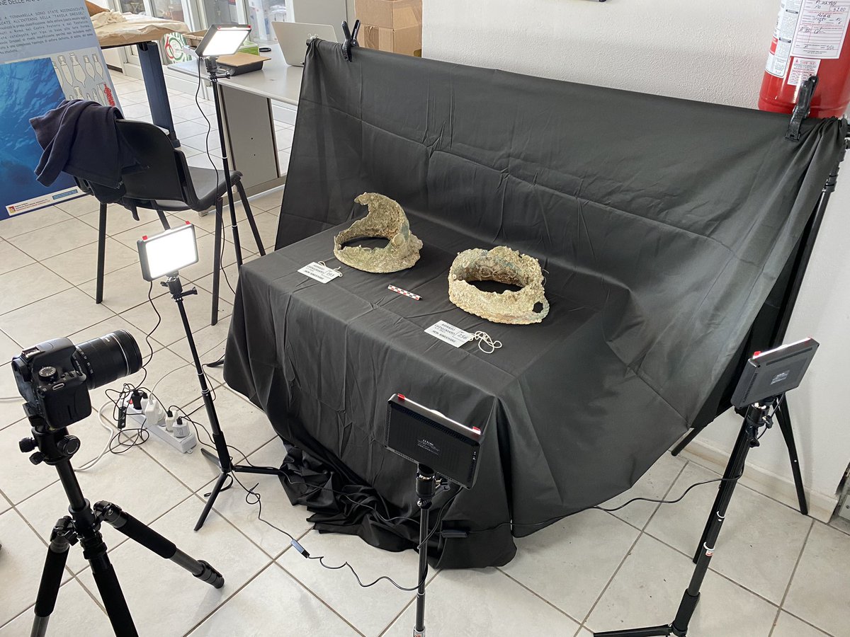 RPMNautical's tweet photo. The careful cataloguing of associated artifacts from the Battle of the Egadi Islands continued yesterday at the Roosevelt Institute. Some of the items being studied include helmets, cheekpieces, coins, and copper spikes. https://t.co/ir0TwcWrsy