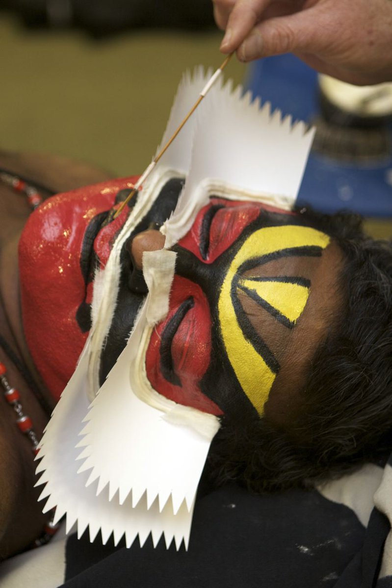 MuseumOfCroydon's tweet photo. Kathakali - Life behind the Costume at the Museum of Croydon
Chutti being applied to create the evil Red Beard character by Kalamandalam Barbara Vijayakuma. The chutti is made from ground rice, chunam and paper shapes. Visit us and experience much more!
#Kathakali
#CroydonLibs https://t.co/B1EMHG06bP