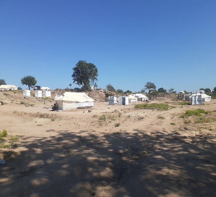 OurCofELike's tweet photo. In January, #CycloneAna meant thousands lost their homes in Tete, #Mozambique. We came to help at the stadium where people gathered. Now some are living in Chimbonde, a resettlement area. Soon we will take maize, beans, rice &amp; supplies for 270 families living there. https://t.co/DvDJfO9xV5