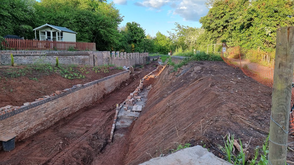 More bricklaying, concrete infilling and bank profiling near old lock 24.