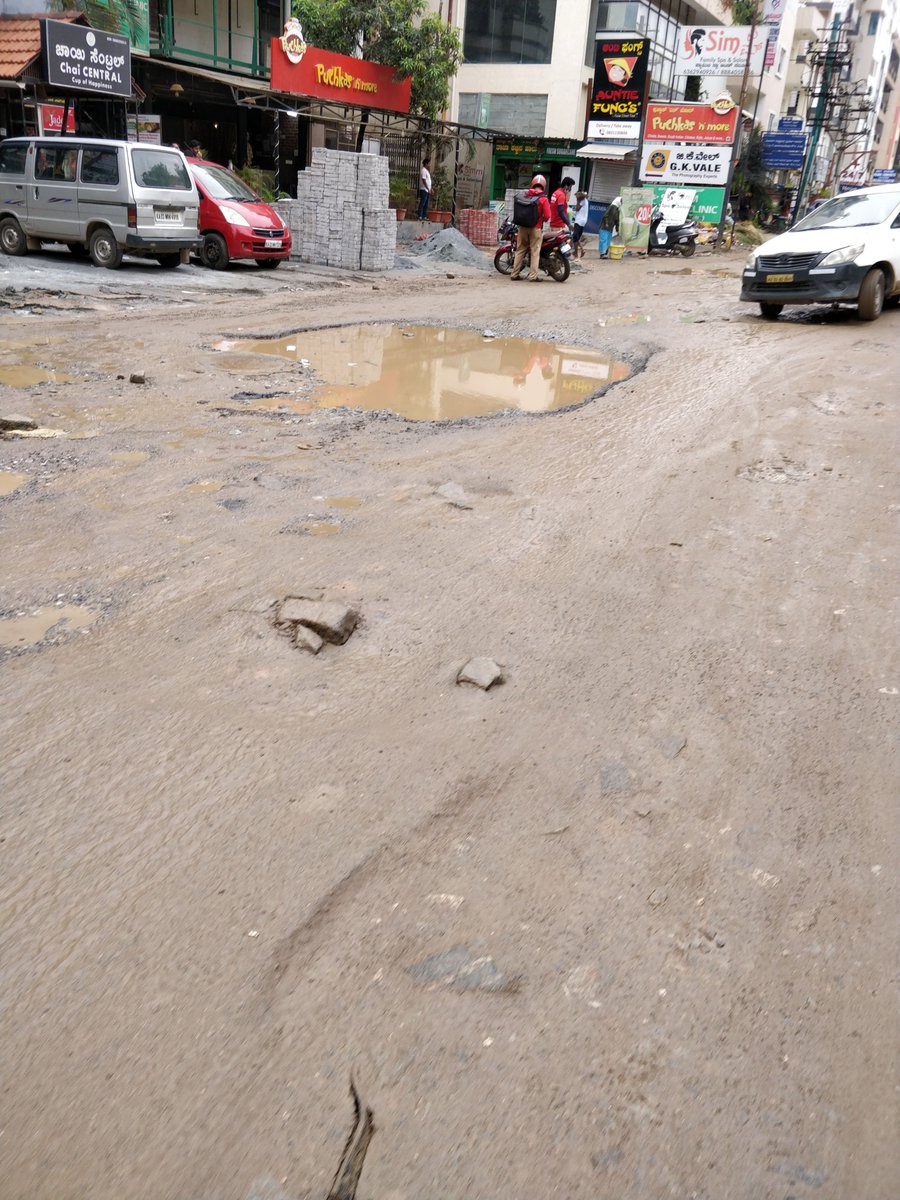 tiwarimuk's tweet photo. Hi #BBMP @BBMPCOMM 
The road from Spice Garden bus stop to Hope Hospital is in very bad condition. During heavy rain fall it is difficult to travel on this road. It is full of deep potholes. Could you get it fixed or build a drainage system here.
Thanks https://t.co/MNWEWSlX95