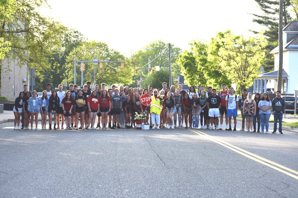 NPCitySchools's tweet image. NPHS Class of 2022 played a "senior prank" on Bobbi Delpaiz, the NPHS Crossing Guard.  Typically pranks are not positive in nature, however, this one brought our beloved Bobbi to tears.  Each senior brought her a flower to thank her for her compassion and caring for them.