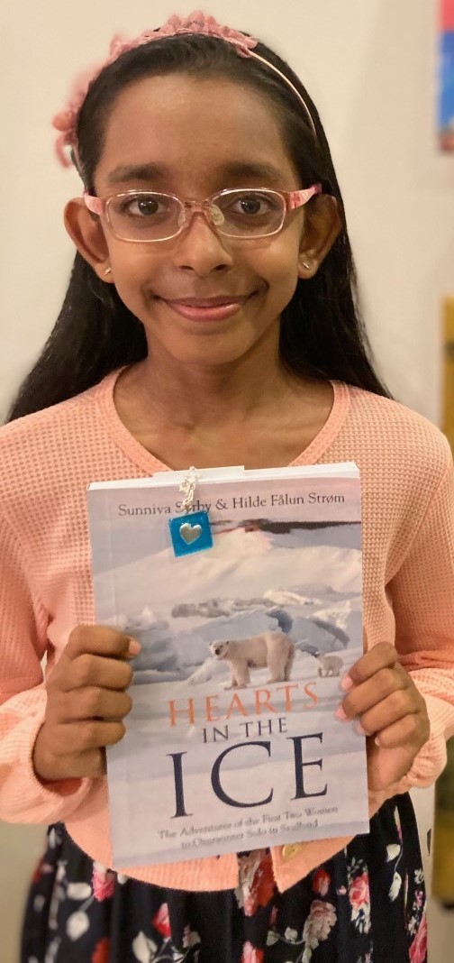marji_puotinen's tweet photo. Huge thanks to @heartsintheice for gifting their new book #HeartsintheIce to #kidscareaboutclimatechange contest (https://t.co/KtQjP5qPsf) winner Laranya from #Singapore!  Well done to Laranya for amplifying the value and impact of her prize by sharing it with her classmates. https://t.co/uli9sI9mLv
